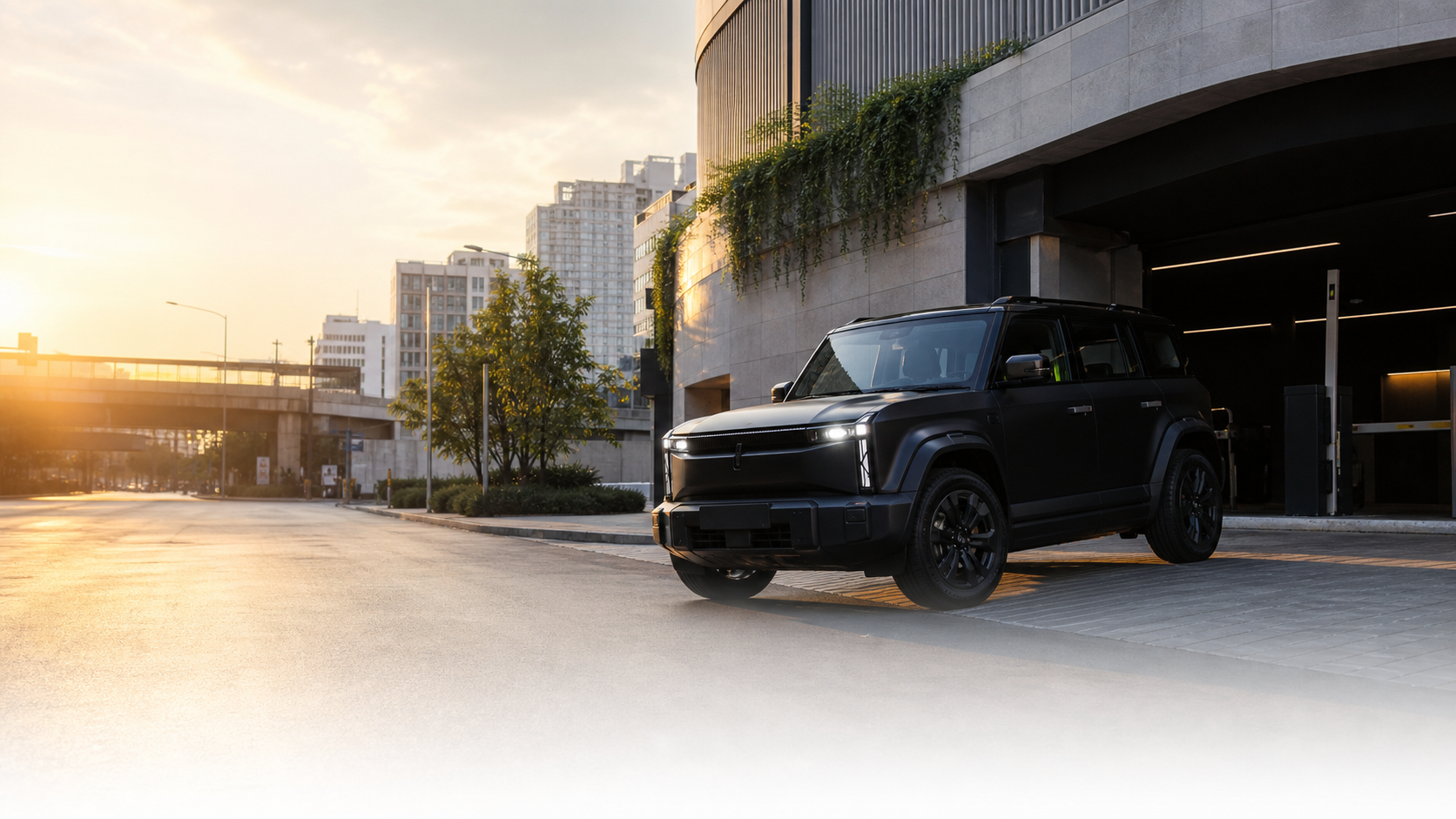 Black NOIRR vehicle in a Bangkok garage, warm daylight